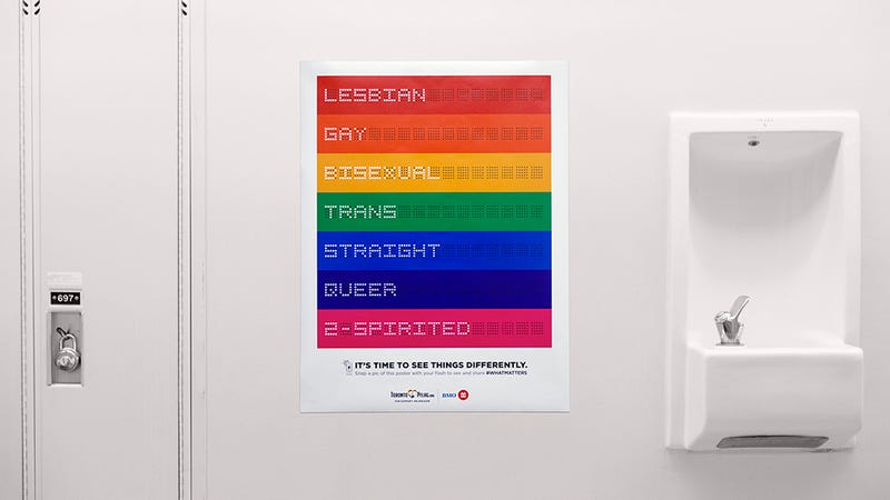 A Camera Flash Reveals This Poster's Secret LGBTQ Support Message