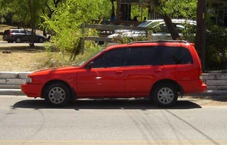 Mystery Nissan Minivan-ish Wagon Down On The Austin Street
