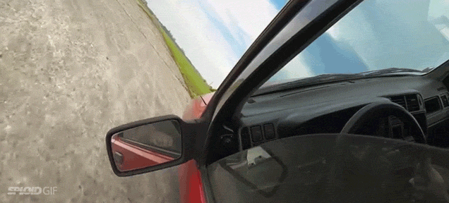 Crazy guys drive their car sideways on the ground