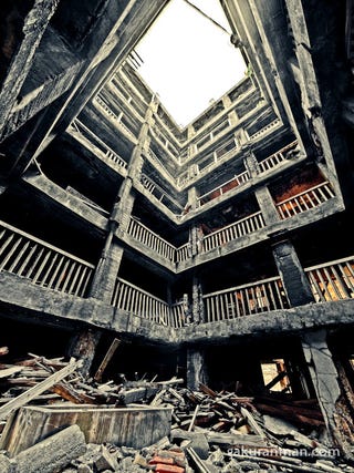 The abandoned man-made island shaped like a battleship