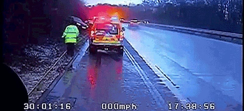 This Lucky Cop Didn't Even Realize He Was About To Get Run Over