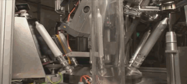This mesmerizing machine rolls and unrolls condoms