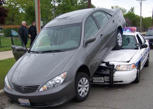 toyota backs over cop car #7