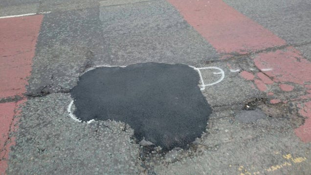 photo of Spraypainting Phalluses On Potholes Is One Way To Get Them Fixed image