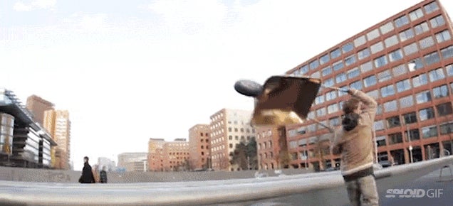 Guy using wheel barrow to do skateboard tricks is hilariously absurd