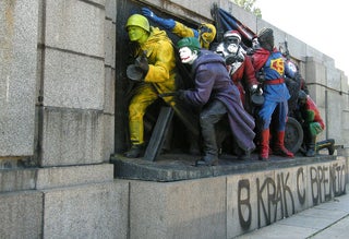 Bulgarian street artists turn Soviet war memorial into Superman, Wolverine, and other superheroes