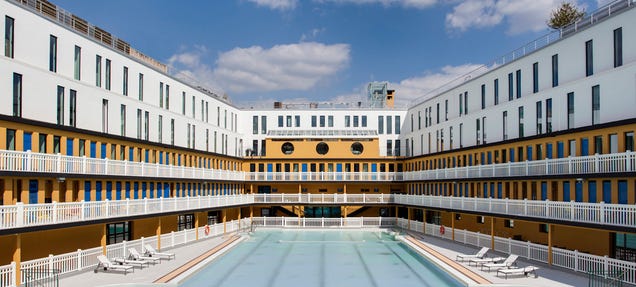 This Iconic Parisian Swimming Pool Is Reborn After 25 Years of Neglect