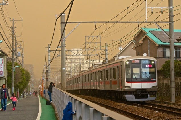 Sand, Smog, or Something Covered Japan in a Yellow Haze