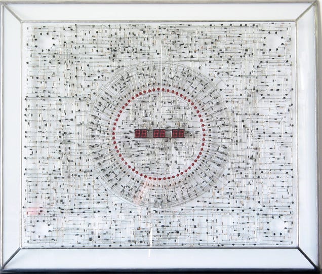 Some Very Patient Genius Soldered a Digital Clock From 1,916 Components