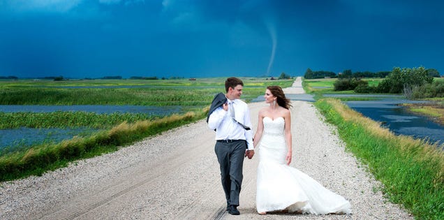 Couple gets their wedding photos with a tornado in the background