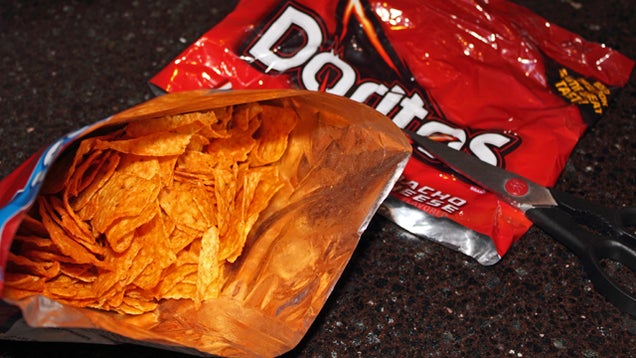 Cut Off The Tops of Chip Bags to Get to The Bottom Without a Mess