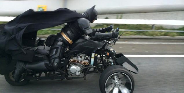 This guy is driving a batcycle around Japan in a perfect Batman costume