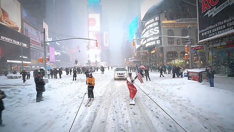 Why Be Snowed In When You Can Snowboard Through NYC Behind A Jeep Wrangler?