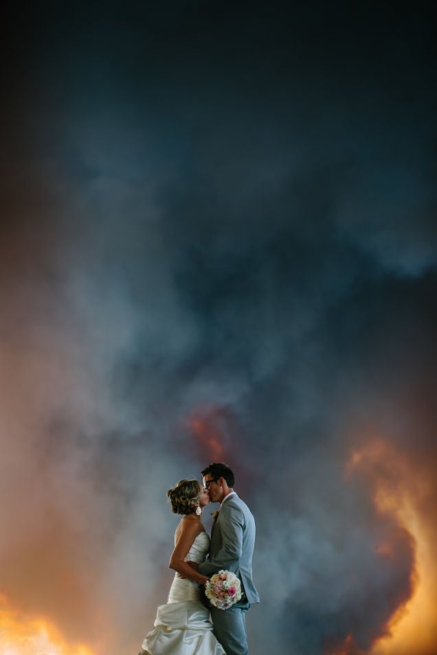 Couple Gets Their Wedding Photos With A Tornado In The Background