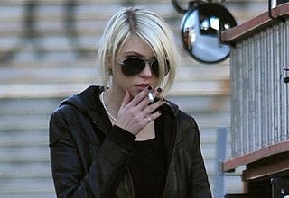 16-Year-Old Starlet Sullies Nubile Young Lungs with Cigarette