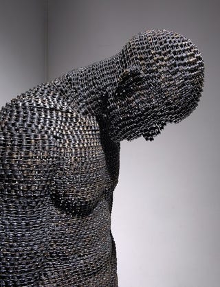 Bike Chains Welded into the Shape of Human Despair