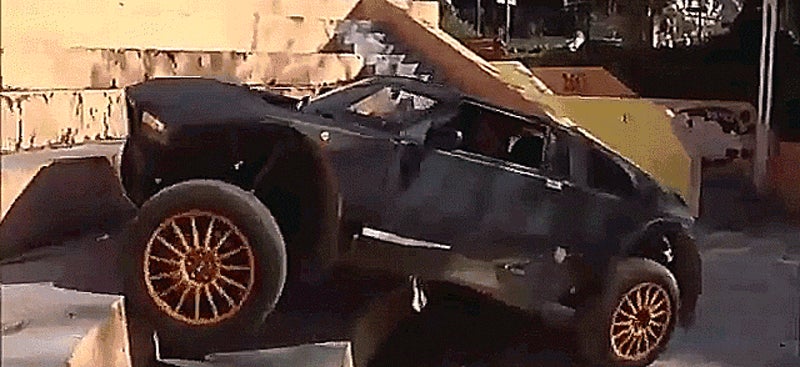 Watch This Ratty Off-Road Sports Car Climb Stairs And Kick Ass
