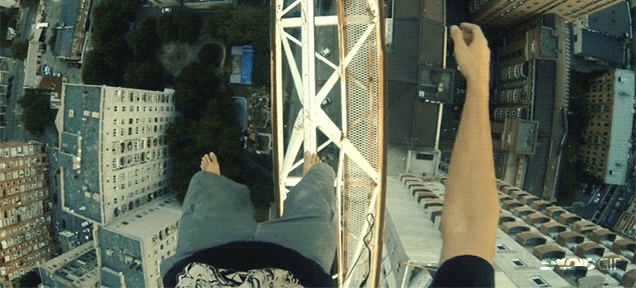 Fearless guy walks and dances barefoot on a crane in terrifying video
