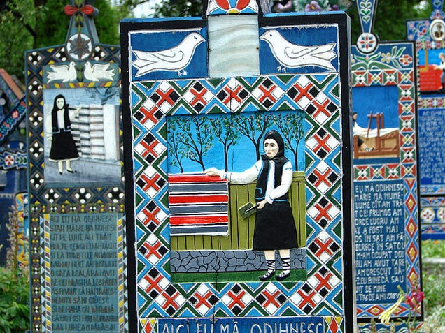 In the world's most cheerful cemetery, the tombstones are brightly painted and jokes are written on the graves