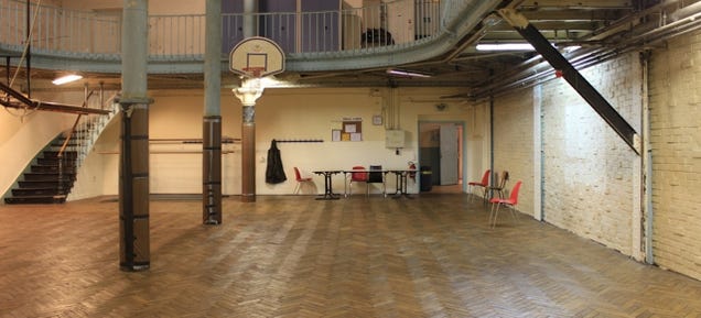 The world's oldest basketball court has iron poles in the middle of it