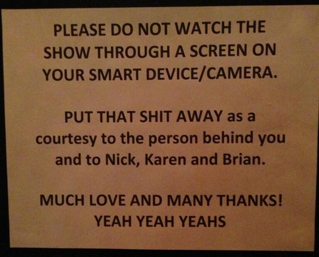 Yeah Yeah Yeahs Post Sadly Necessary Sign Asking Fans Not to Watch Their Show Through a Smartphone Screen
