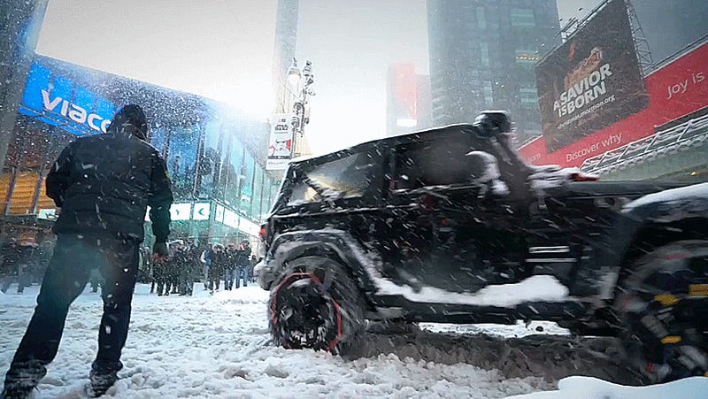 Why Be Snowed In When You Can Snowboard Through NYC Behind A Jeep Wrangler?