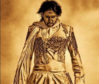 Only One Man Can Pull Off A Gold Superhero Costume, And Save The Universe