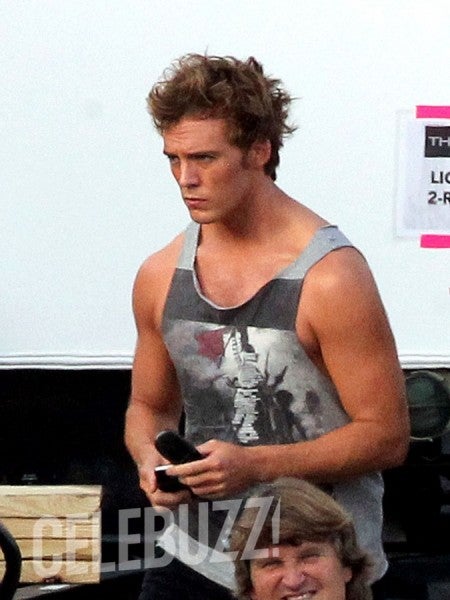First set pics from Catching Fire show new the Hunger Games training outfits... and Finnick!