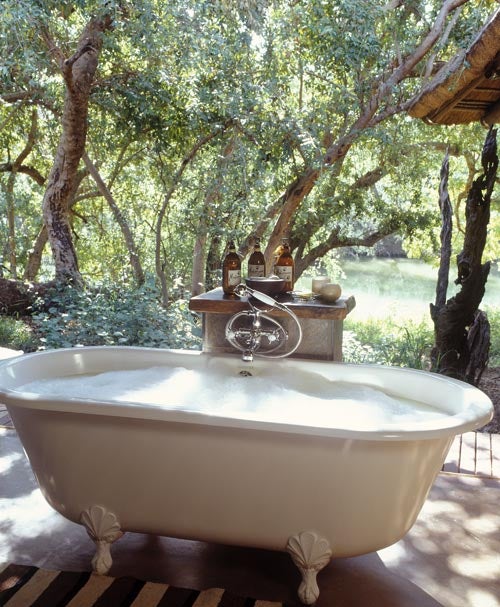 Who Doesn't Want to Live In This House With Elephants In the Garden?