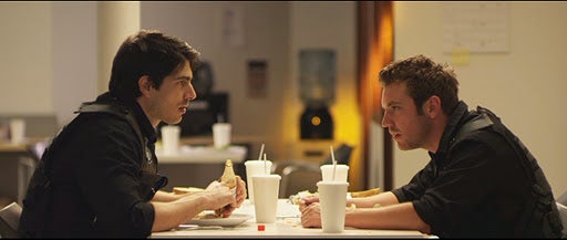 Your first look at the "monsters versus security guards" flick Cost of Living