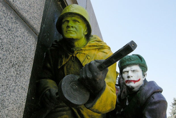 Bulgarian street artists turn Soviet war memorial into Superman, Wolverine, and other superheroes
