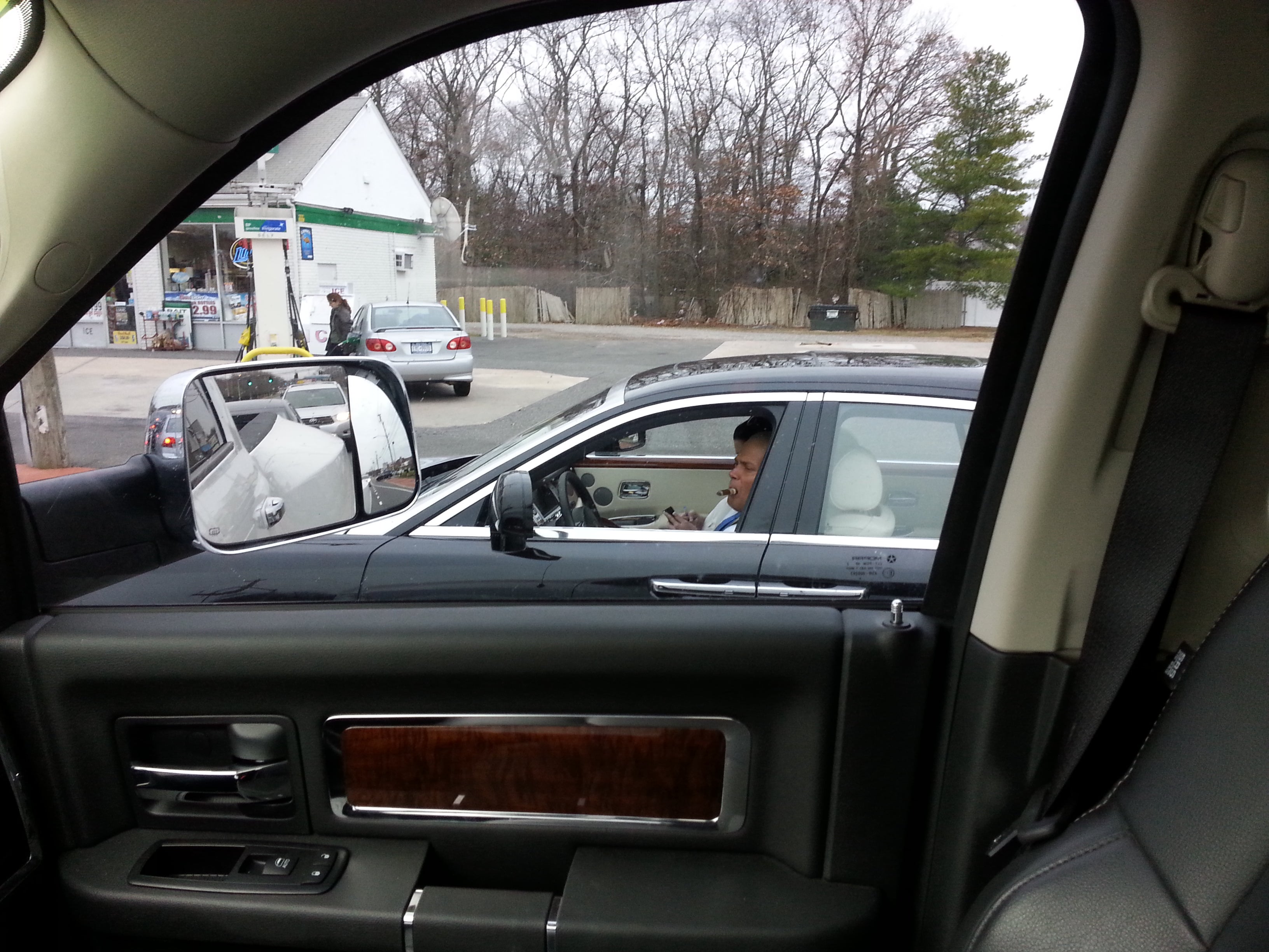 Steamin' a cigar in the Rolls like a gotdamn boss!