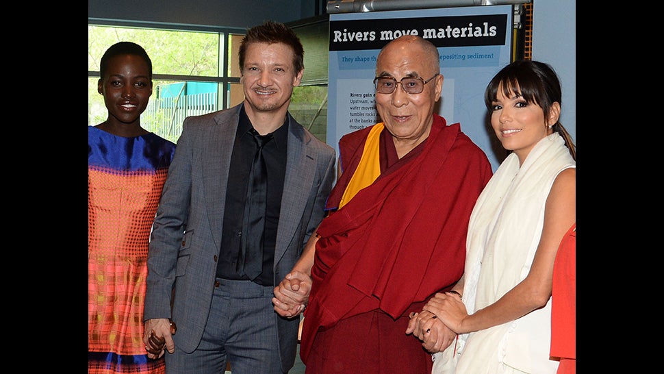 Caption This Photo of Lupita, Jeremy, His Holiness and Eva