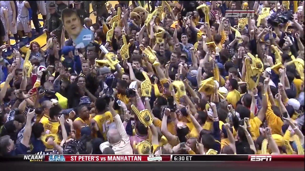 WVU Upsets Kansas; Fans Storm Court With Giant Richie Incognito Face