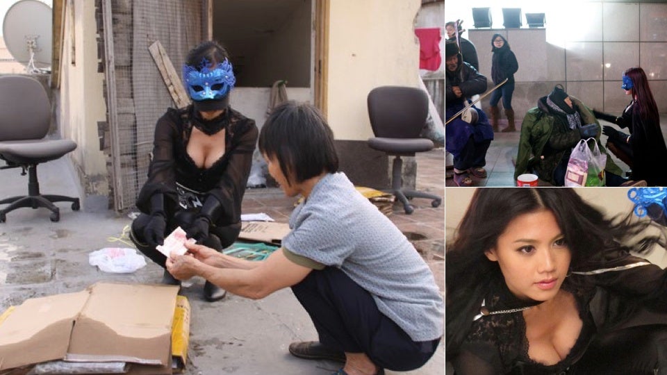 Real-Life Superhero Helps the Homeless with Food, Money, and Cleavage
