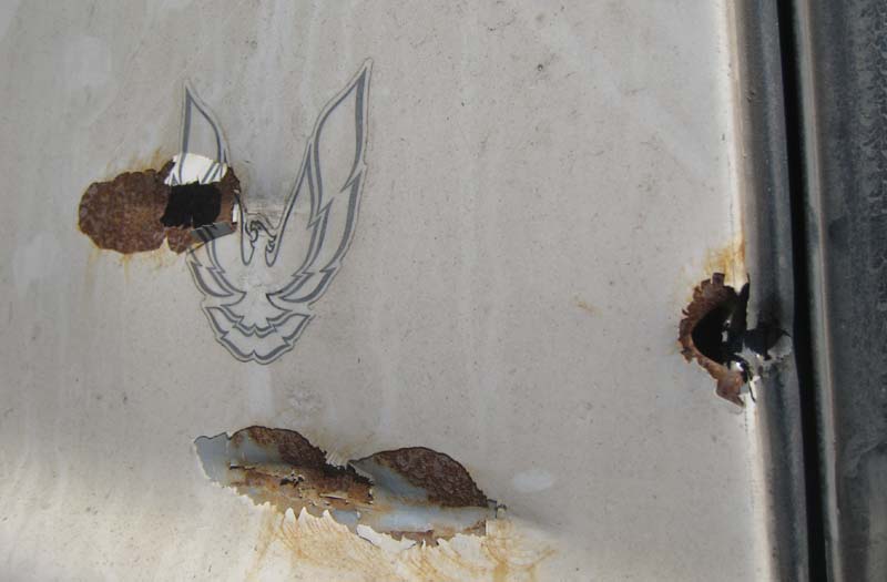 Bullet-Riddled And Abused, Malaise Firebird Accepts Junkyard Fate