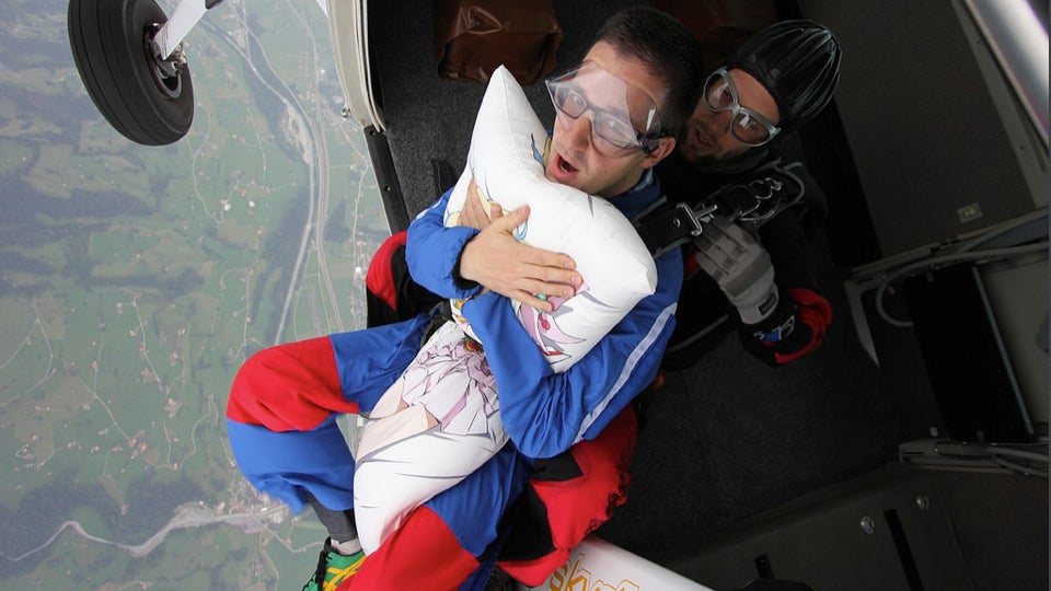 Pure Nerd Insanity: Two Men Skydiving with a Girly Hug Pillow