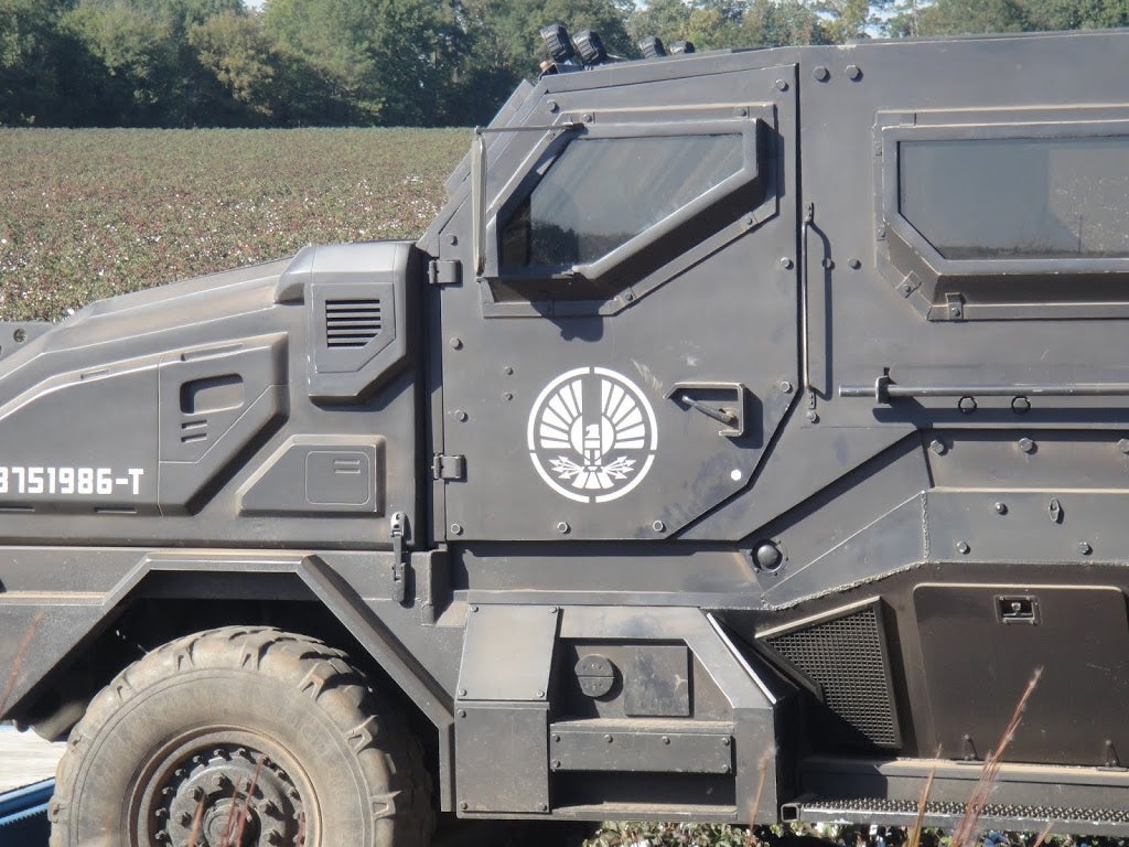 New Catching Fire pics show trouble in District 11