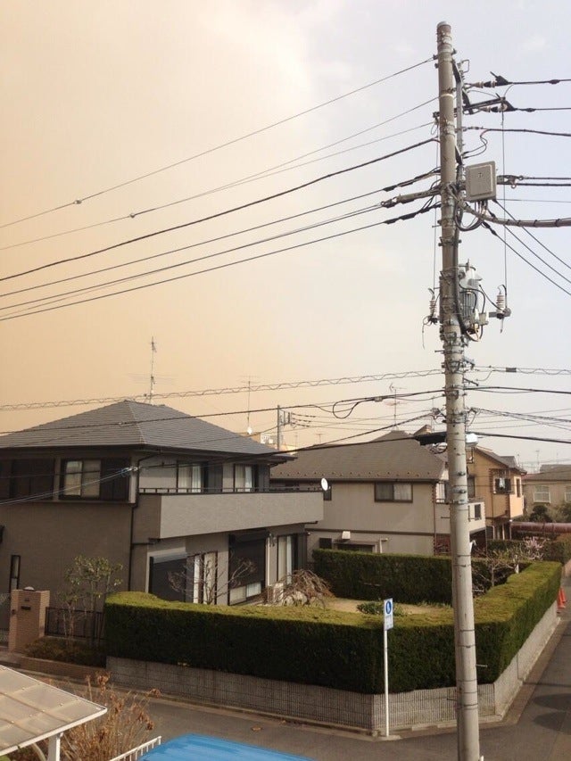 Sand, Smog, or Something Covered Japan in a Yellow Haze