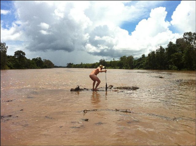 Drunk, Naked Fisherman Paddles Across Croc-Infested River on a Log to Win Bet for Whiskey: 'It Seemed Like a Good Idea at the Time' (NSFW)