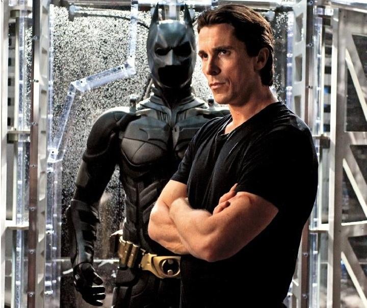 6 new Dark Knight Rises snapshots show off Batman's Bat-abs