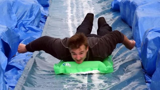 Would You Go For A Ride On This Massive Slip 'n Slide On A City Street?
