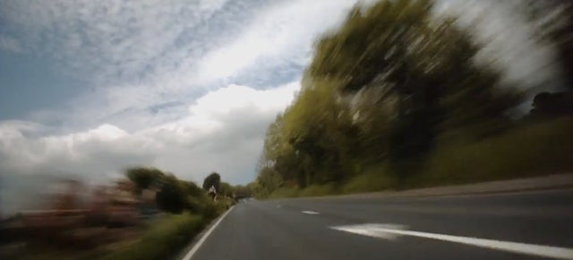 Watch how scary fast a motorcycle goes during a high speed race