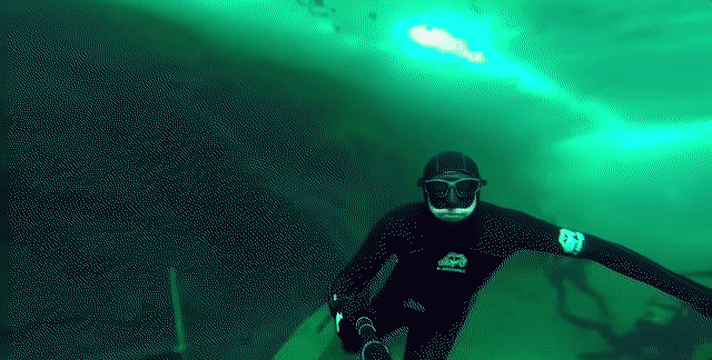 ...Matthew Villegas recently went free diving underneath the frozen lake of...