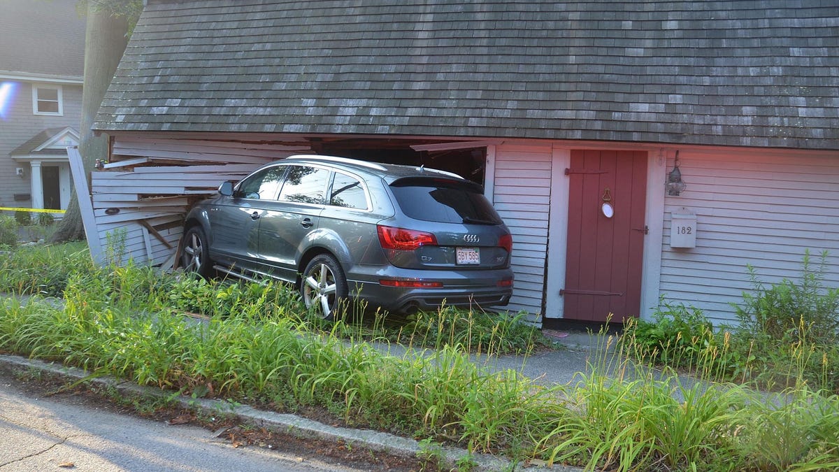 Driver Swerves To Avoid Squirrel Crashes Into Historic Home