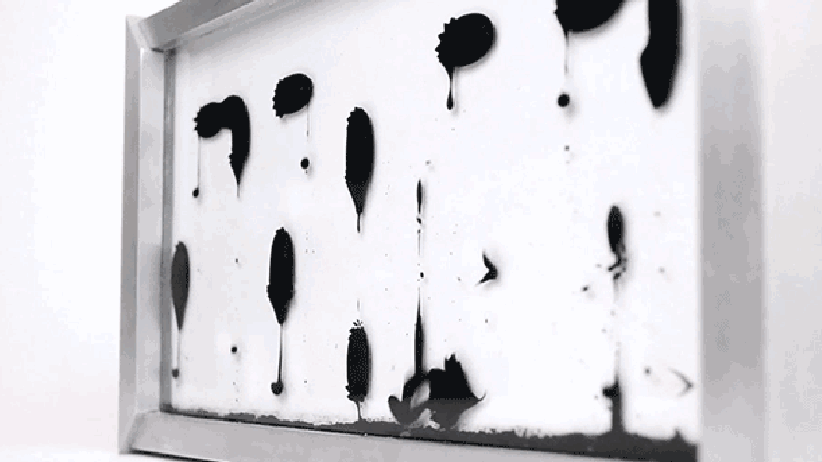 Watching The Numbers Flow On This Ferrofluid Clock Is Almost Therapeutic