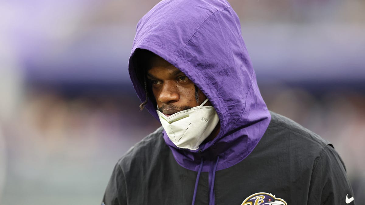 After missing OTAs, Lamar Jackson is back with the Ravens, and still without a c..