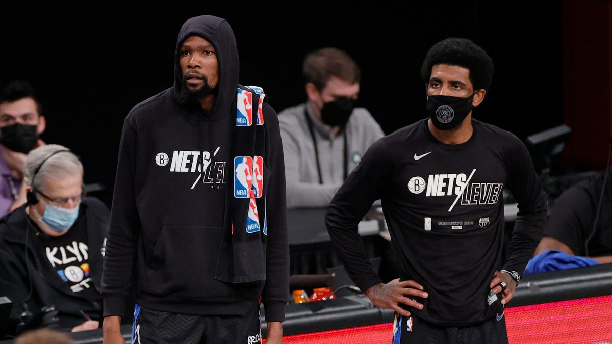 Kevin Durant and Kyrie Irving become eighth, ninth Nets players to enter COVID p..