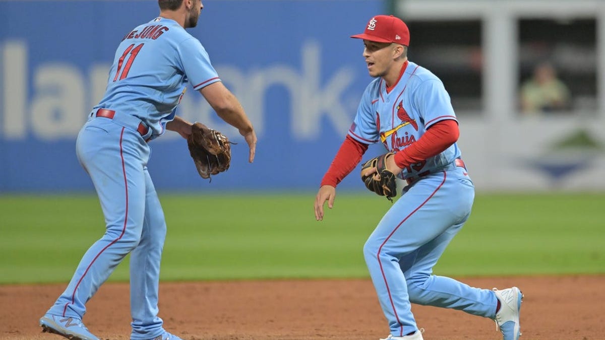 Cards squeeze past Guardians on passed ball in extras