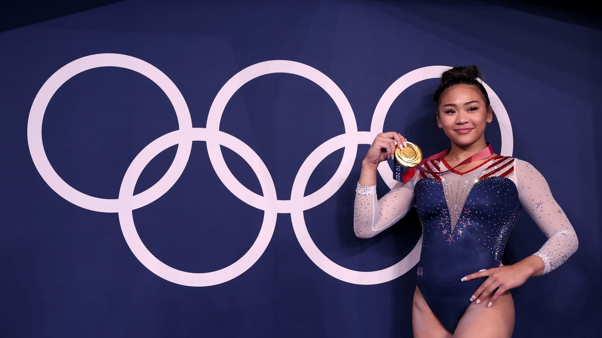 Suni Lee steps in for Biles and everything she touches turns gold